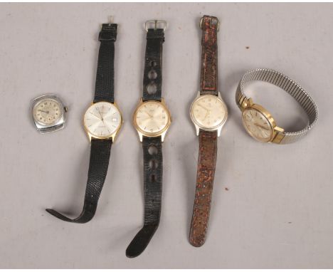Four vintage gents wristwatches, along with a watch head including Ingersoll, Roamer, Smiths etc.