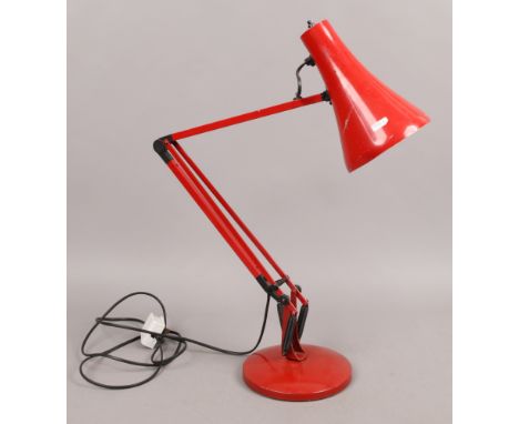 A painted anglepoise reading lamp.