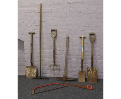 A collection of gardening and ground work hand tools, shovels, spades, rake etc.