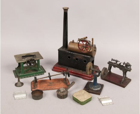 A tin plate line steam flat bed engine and quantity of tools.