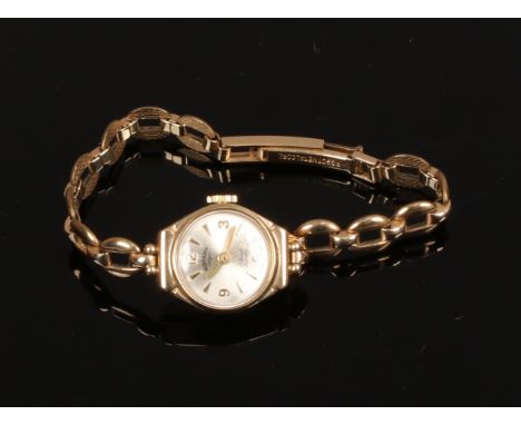 A ladies 9ct gold Rotary Incabloc manual wristwatch head on yellow metal bracelet strap.Condition report intended as a guide 