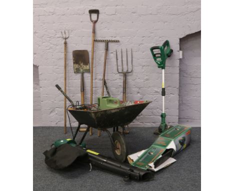 A garden wheel barrow, cordless hedge trimmer, 230 volt leaf blower / vacuum along with a 18 volt strimmer and charger and va