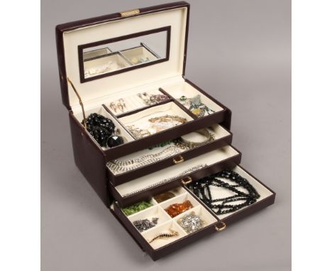 A jewellery box and contents of costume jewellery including brooches, necklets, rings, bracelets etc.