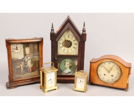 A Waterburg Clock Company alarm clock, 1950's H.A.C mantel clock, oak framed picture clock and two carriage clocks.Condition 