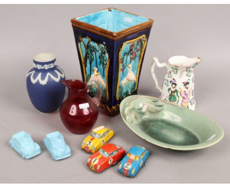 A Majolica square tapering planter, Adams Jasperware vase, Clarice Cliff Celadon dish, tin plate clockwork toy cars and a rub