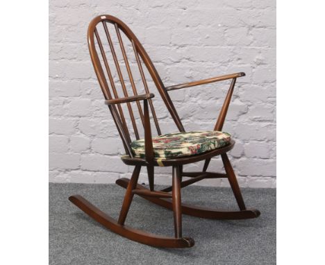 An Ercol spindle back rocking chair.