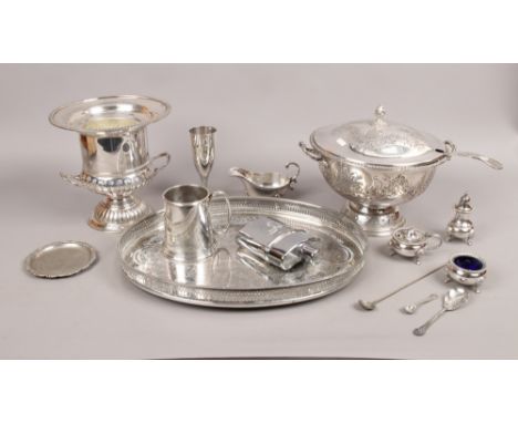 A collection of silver plate to include ornate punch bowl and serving spoon, wine cooler, Viners sauce boat, hip flask etc.