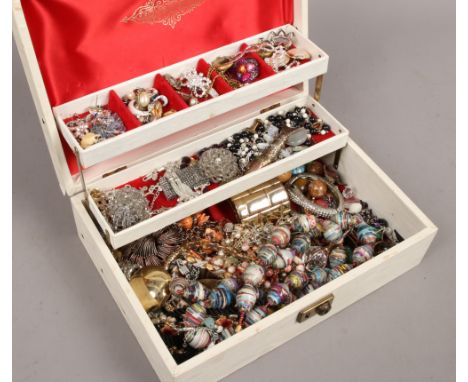 A case of costume jewellery to include necklaces, beads, earrings etc.