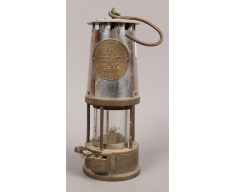 An Eccles type SL miners safety lamp.