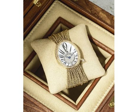 Breguet. A lady's fine 18K gold diamond set automatic bracelet watch with mother of pearl dialModel: Reine De NaplesReference