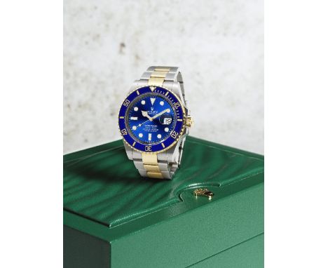 Rolex. A fine stainless steel and gold automatic calendar bracelet watchModel: SubmarinerReference: 126613LBDate: Purchased 1