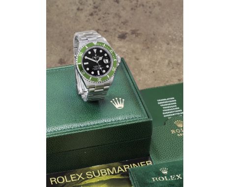 Rolex. A stainless steel automatic calendar bracelet watch with 'flat 4' bezel insertModel: Submariner 'Kermit Flat 4'Referen