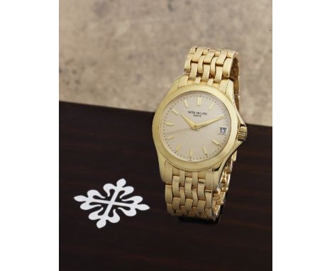 Patek Philippe. A fine 18K gold automatic calendar bracelet watchModel: CalatravaReference: 5107/1J-001Date: Purchased 10th S
