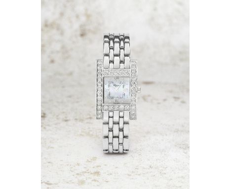 Chopard. A fine lady's 18K white gold diamond set quartz bracelet watch with mother of pearl dialModel: Your HourReference: 1