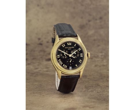 Patek Philippe. A fine 18K gold automatic annual calendar wristwatch with 24 hour indicationReference: 5035J-010Date: Purchas