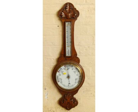 Edwardian oak aneroid barometer. Condition report: see terms and conditions