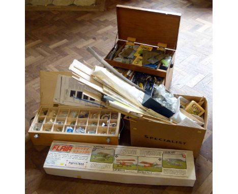 Two wooden chests of small components and tools some relating to model aircraft, two engines (Max-5) and a quantity of balsa 