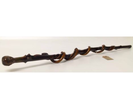 African walking stick with carved figure head and entwined snake decoration Condition report: see terms and conditions