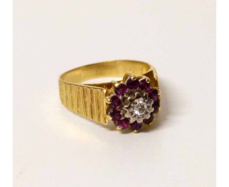 18ct gold ruby and diamond cluster ring. Condition report: see terms and conditions