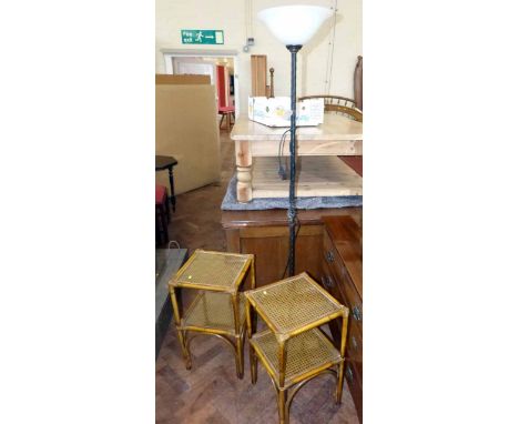 Two cane work side tables with glazed tops, also an iron standard lamp. Condition report: see terms and conditions