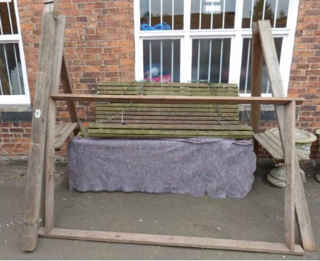 Wooden garden swing bench. Condition report: see terms and conditions