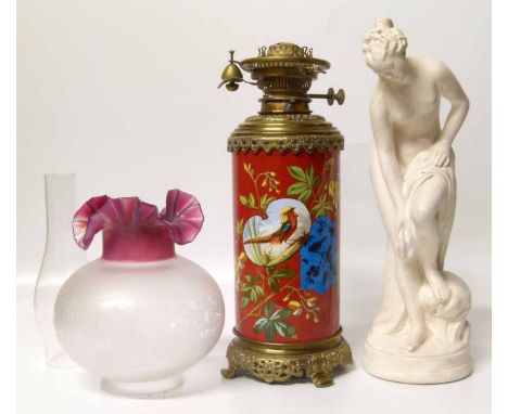 Hinks & Son patent oil lamp on ceramic base decorated with exotic birds and foliage and a plaster figurine. Condition report: