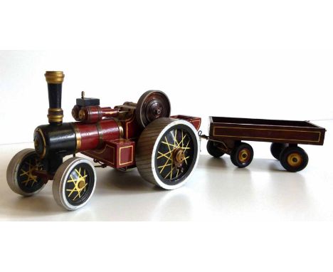 Home built traction engine with wind up mechanism and four wheeler trailer (J. Jones). Condition report: see terms and condit