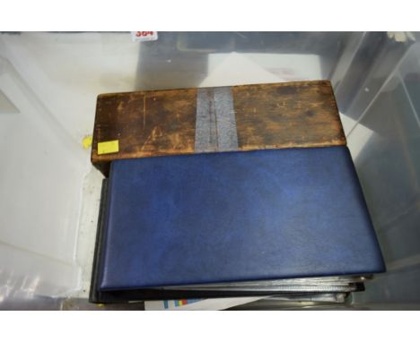 MISCELLANEOUS: a quantity of first day covers in 2 albums, some World War II period official photographs and a wooden box con