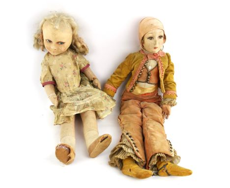 An early 20th century Lenci type doll with painted fabric face, stuffed body and composite hands, 56cm and another, similar d