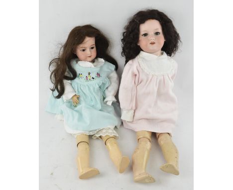 An early 20th century Armand Marseille bisque head doll, mould No 390 (75cm high) and one further Armand Marseille bisque hea