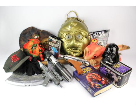 A collection of Star Wars toys and collectables including ; a Ja Ja Binks latex mask,  a 'Sith Lord' cap, a light sabre, Topp