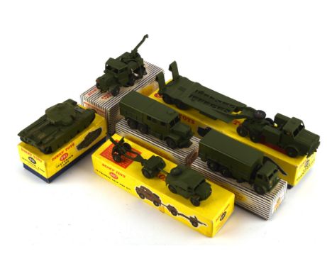 Six Dinky die-cast military vehicles comprising ; 660 Tank Transporter, 697 25-Pounder field gun set,  651 Centurion Tank,  6