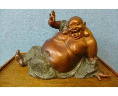 An oriental bronze figure of a seated Buddha, 36cms h 