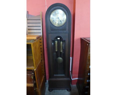 A 1930's oak longcase clock, 205cms h 