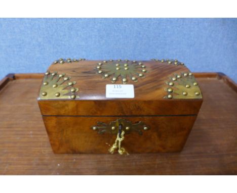 A Victorian walnut and brass mounted tea caddy, 14cms h x 23cms w 