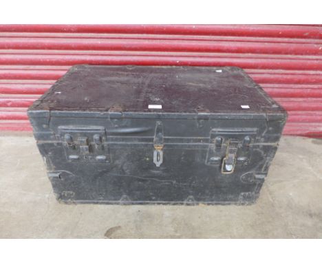 A fitted black metal tool box 