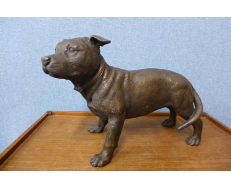A large bronze figure of a Staffordshire bull terrier, 31cms h 