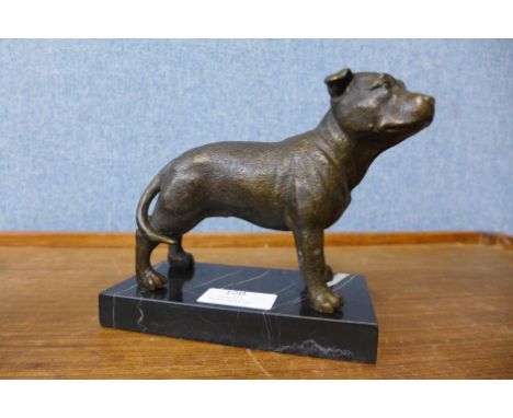 A bronze figure of a Staffordshire bull terrier, on black marble socle, 13cms h 