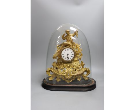 A Victorian gilt spelter mantel clock, under dome,40 cms high,