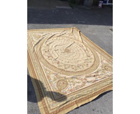 An Aubusson style needlepoint carpet 345cm x 261cm