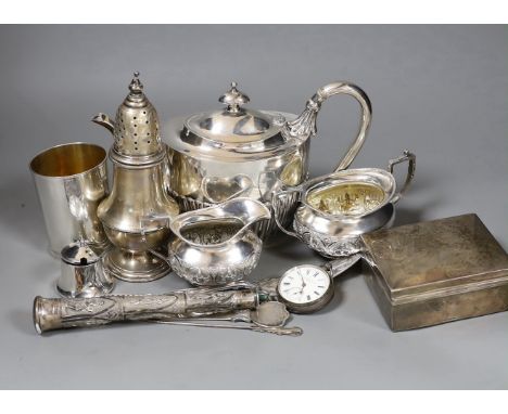 An Indian white metal cream and sugar bowl by Krishnian Chetty of Bangalore, a modern silver beaker by The Marlow Brothers, a