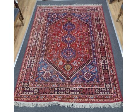 A North West Persian red ground carpet, 240 x 170cm