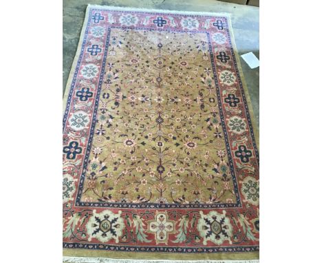 A Heriz style gold ground carpet, 370 x 244cm