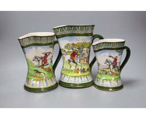 A graduated set of three Royal Doulton hunting jugs, 22cm