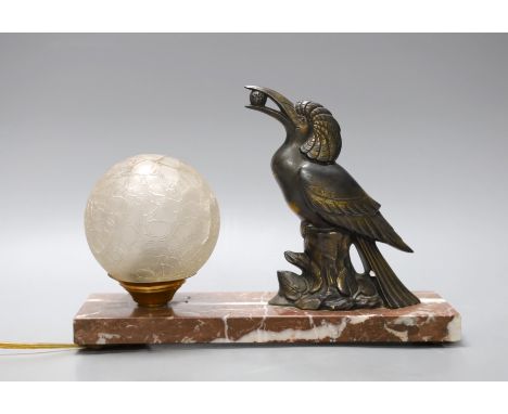 A French 1930's spelter toucan lamp with crackleware shade on plinth base, 18cm wide