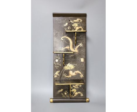 A Chinese lacquer ‘dragon’ wall shelf, 55x25cm