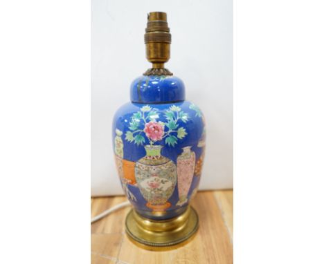 A late 19th century Chinese jar and cover with blue background and fine enamelled vases, jars, etc., later converted into a t