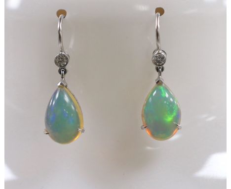 A pair of white metal, opal and diamond set earrings, overall 25mm, gross weight 2.6 grams.