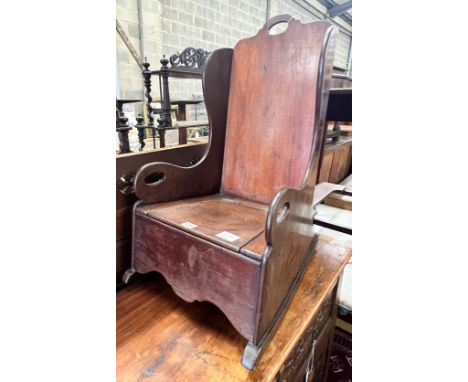 A child's Victorian mahogany wing back commode chair, width 37cm, depth 57cm, height 71cm