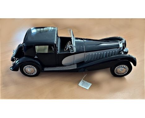 The 1931 Bugatti Royale Coupe De Ville Die Cast Model Scale 1:16. assembled from over 100 component parts. 37.5 cm long, 12cm